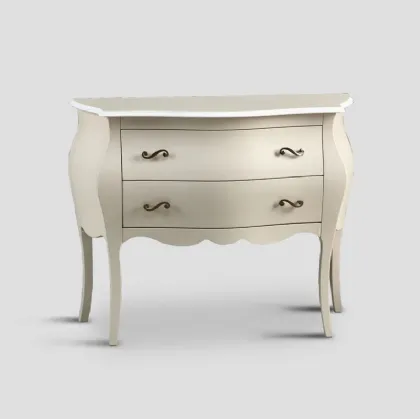 Comò sagomato Julian realizzato in legno laccato color crema con rifiniture bianche di Dialma Brown
