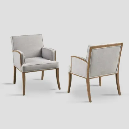 Poltroncina Angelica imbottita e rivestita in tessuto con struttura in legno di Dialma Brown