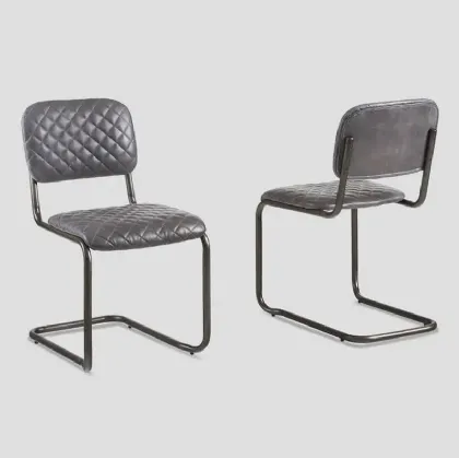Sedia Philadelphia in vera pelle trapuntata con struttura in metallo di Dialma Brown